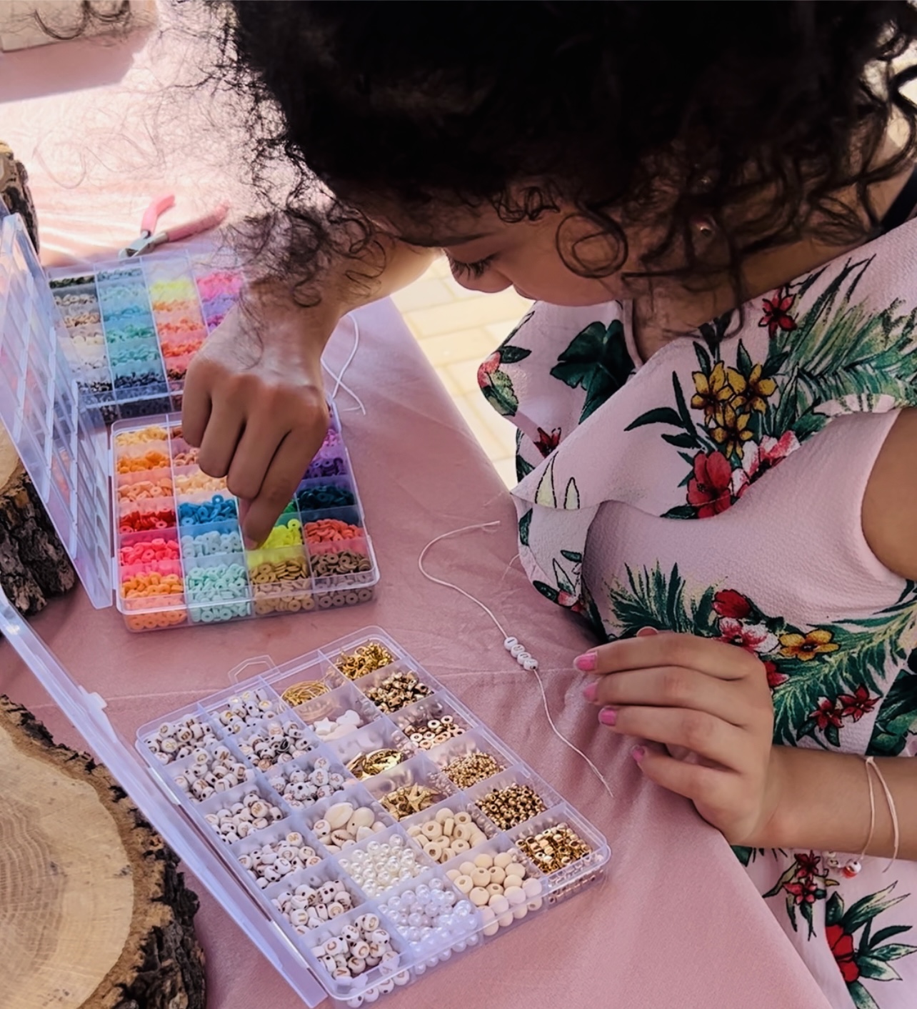 Children doing crafts and beadwork