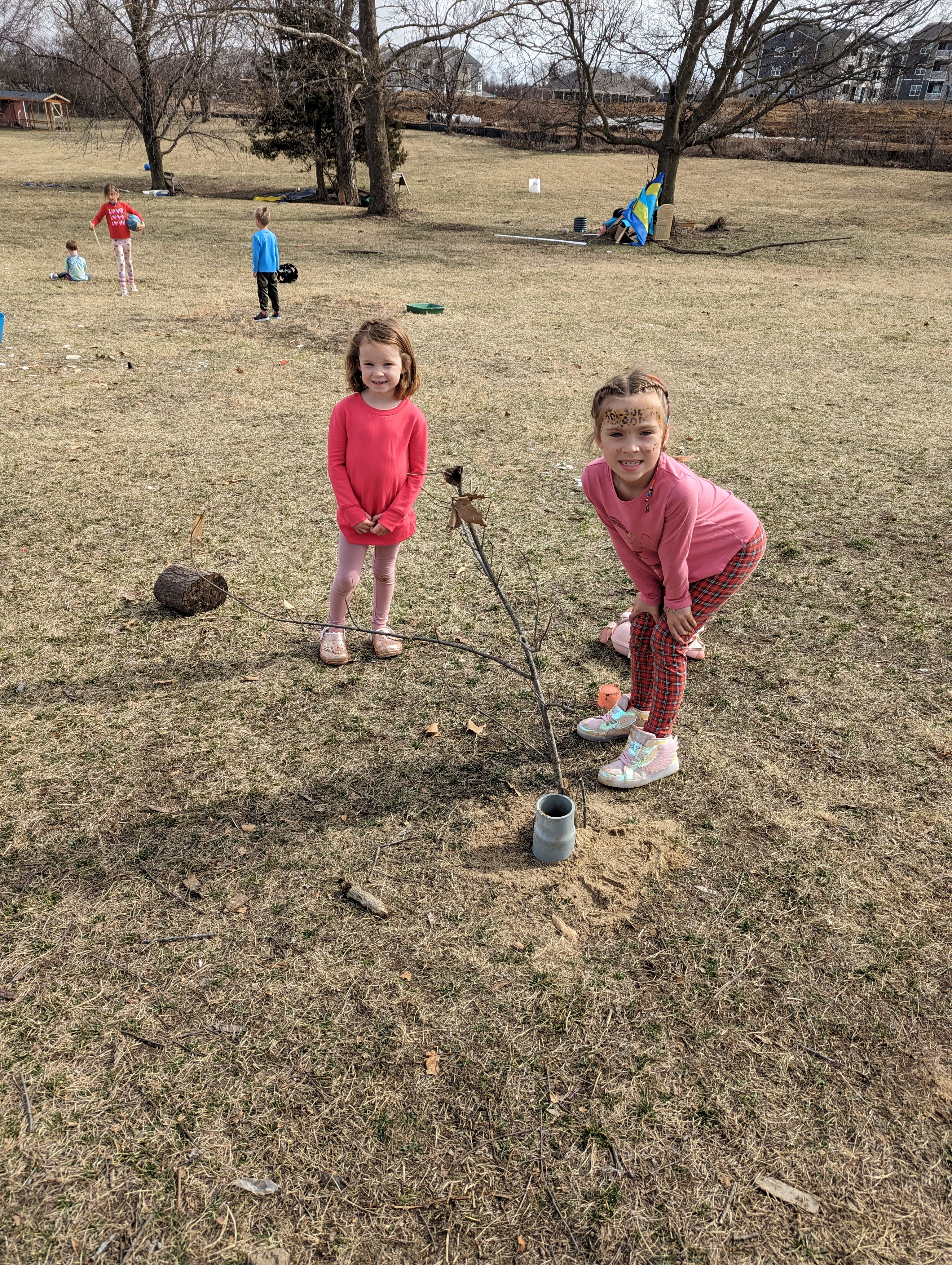 Children planting and learning outdoors